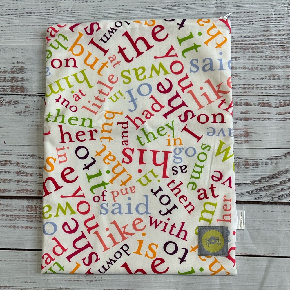 3 for $21!
Itzy Ritzy Travel Happens Wet Bag in Sight Word Soup Print